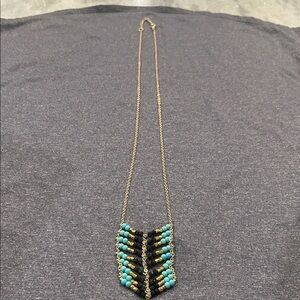 Beaded turquoise, black & gold Necklace with Gold Chain. Hangs approx 17”